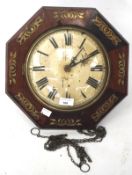 A 19th century wall clock, the dial with Roman numerals and marked 'A.