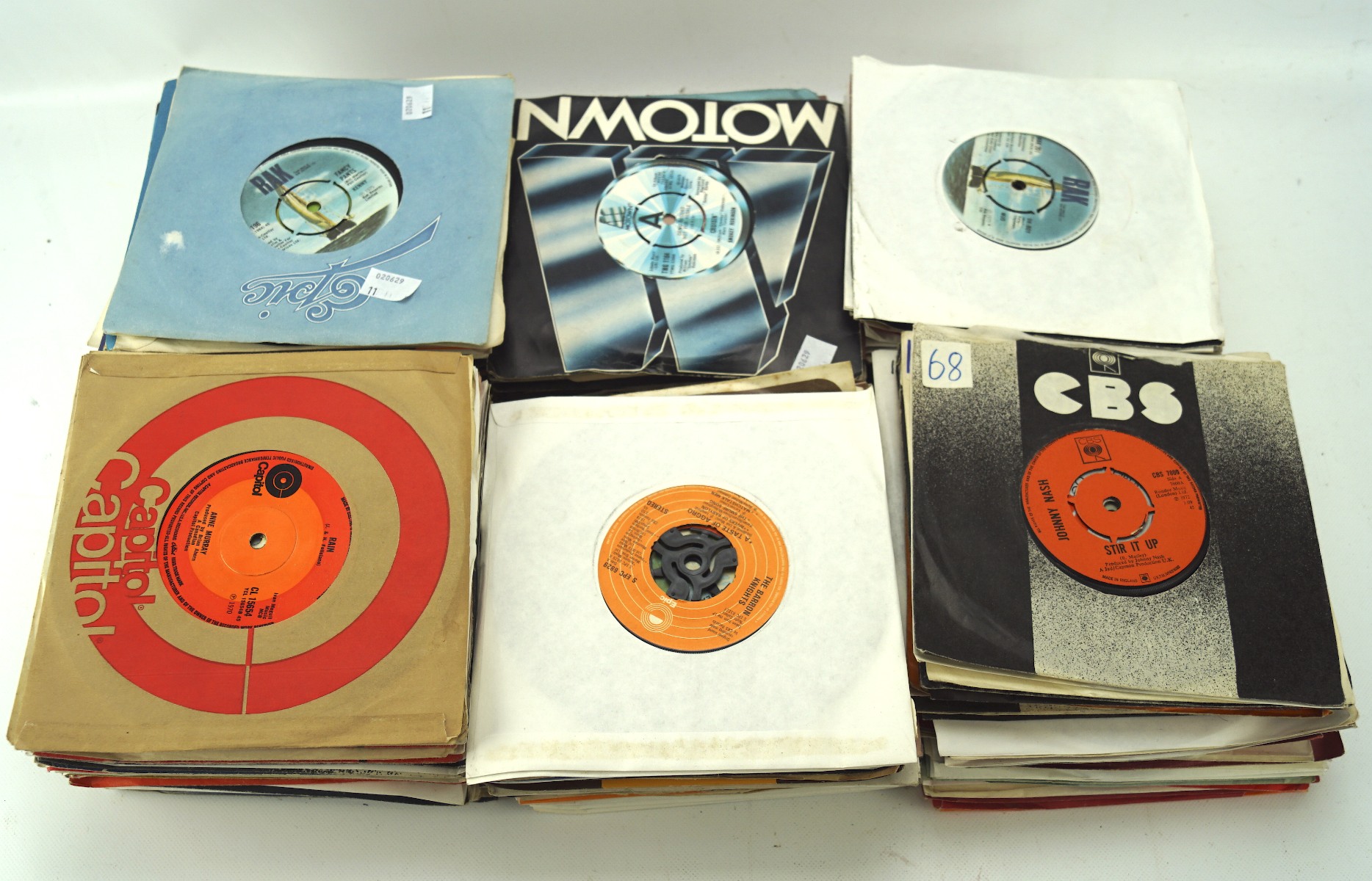A large quantity of vintage vinyl singles, including Hot Chocolate,