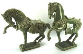 A pair of green glazed Italian Tang style horses,