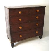 A late 19th century/early 20th century stained wooden chest of drawers,