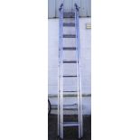 A large three sectional Youngman 100 metal ladder Condition Report: Length of ladder