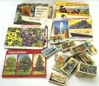 A large selection of vintage tea cards, most being by Brooke Bond,