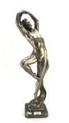 An Austin Prodinc cast resin sculpture, depicting a nude figure, signed 'Muci',