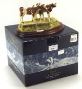 A Border fine arts figure group titled 'Ayrshire Calves, model B0216B,