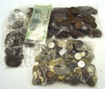 A collection of 19th and 20th century coinage, including British silver coins, half crowns,