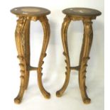 A pair of gilt wooden jardiniere stands, supported on three cabriole legs, 74cm x 31.