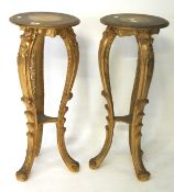 A pair of gilt wooden jardiniere stands, supported on three cabriole legs, 74cm x 31.