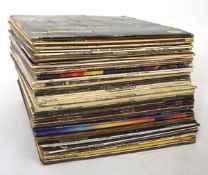 A collection of assorted vinyl, including Pink Floyd and Saturday Night Fever,