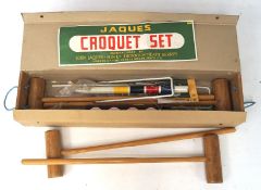 A vintage Jacques croquet set, manufactured by John Jacques and sons ltd, Thornton Heath, Surrey,