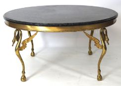 A contemporary marble topped table, of circular form, the cast brass base modelled as swans,