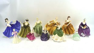 Eleven Royal Doulton and Coalport figures of ladies, the Doulton ladies including 'Kirsty',