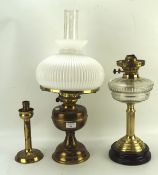 Two Dulplex oil lamps, one with cut glass reservoir,