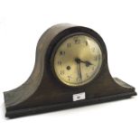 A Napoleon hat shaped mantel clock, the silvered dial with Arabic numerals,