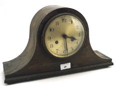 A Napoleon hat shaped mantel clock, the silvered dial with Arabic numerals,