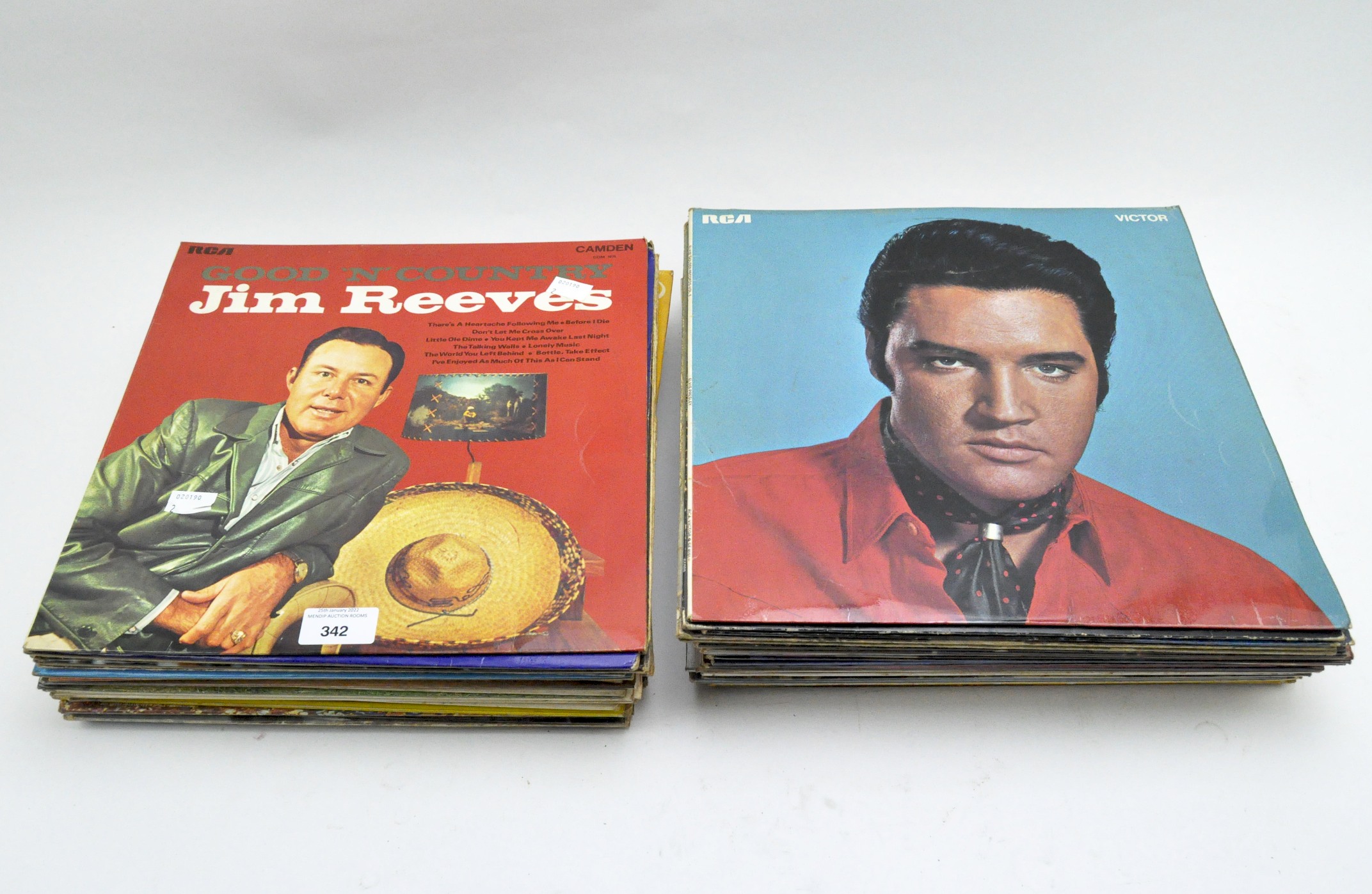 A collection of vintage pop & rock music records, including: Jim Reeves, Russ Conway,