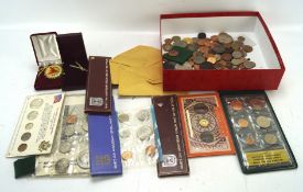 A collection of assorted coins, to include two £5 coins,