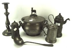 A collection of pewter wares, to include a lidded tureen with serving ladle,