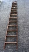 A large vintage wooden ladder,