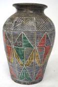 A large contemporary pottery vase, with textured and coloured decoration to the exterior,