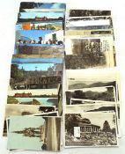 A selection of assorted postcards, most being 20th century British scenes, including the ferry lake,