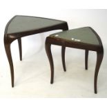 A pair of triangular side tables, with mahogany veneered frames and inset with green leather,