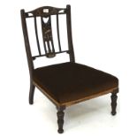 A veneered wooden parlour chair, the frame with inlaid details,