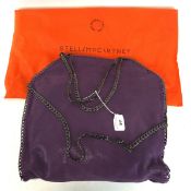 A Stella McCartney purple suede handbag, with metal trim and handle,