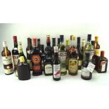 A collection of assorted alcohol including wine, spirits, and more,