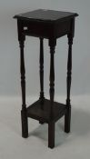 An Edwardian mahogany jardiniere stand, with undertier,