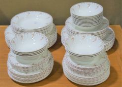 A vintage collection of Wedgwood Pink Garland dinner service, including dinner plates,