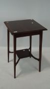 A 20th century mahogany occational table, with inlaid borders,