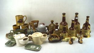 A collection of ceramics, including a Wade Feline collectors tea pot, fish ash tray,