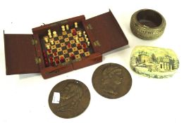 Assorted collectables, to include a vintage travelling chess set, two metals plaques,
