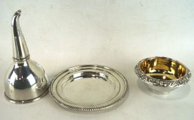 A 19th century silver plated wine funnel and drip tray, the wine funnel with gilt interior,