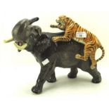 A large Beswick model of an elephant and tiger