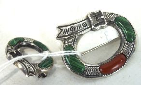 Two vintage Scottish silver brooches, each in the form of buckles with agate set details,