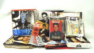 A box of assorted Elvis Presley memrobilia including LPS and ephemera