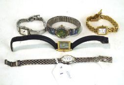 An assortment of ladies wristwatches including a silver Woodford cocktail watch