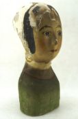 A possibly French 19th century painted papier mache milliner's head of a woman,