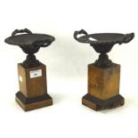 Pair of marble based bronze Gretian style urns with twin fish handles,