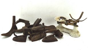 An assortment of 19th century metalware, including cobblers shoes,