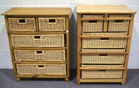 Two pine free standing shelving units, both with wicker drawers, two short over three long,