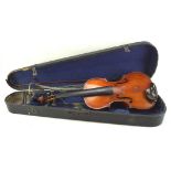 An early 20th century G Puglisi Reale & Figli cased violin and bow,