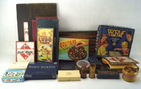 A collection of board games including Monopoly, Dominoes, Solitaire,