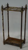 A vintage painted metal stick stand, with six slots,