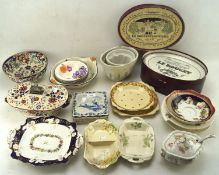 An assortment of mixed ceramics including jelly moulds, bakeware,