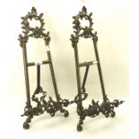 Two 20th century gilt metal picture stands, formed as easels,
