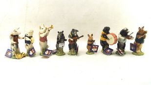 A Beswick promenade of pigs playing instruments,