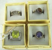 Four 925 sliver ladies rings, of assorted designs,