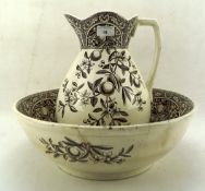 An ironstone Prince jug and basin with brown pattern of fruiting branches on a cream base,